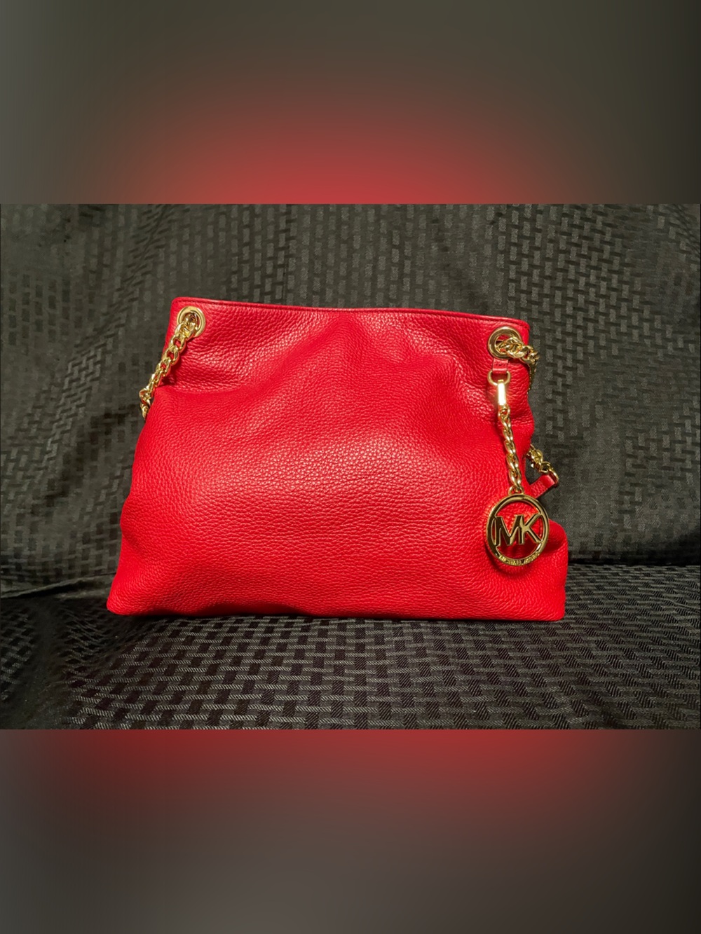 Michael Kors Red Pebbled Leather Clutch with Gold Chain & MK Charm/ like new